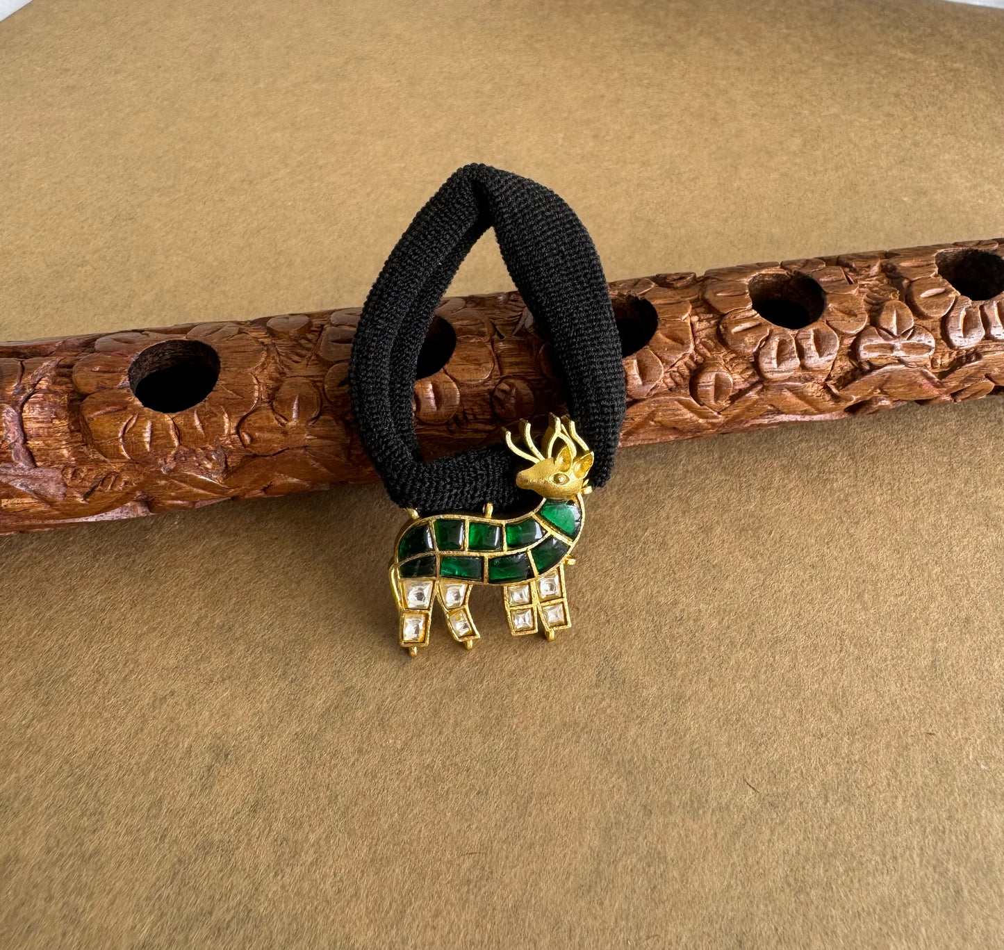 Matte finish green-white kundan jadau deer hair band dj-51517