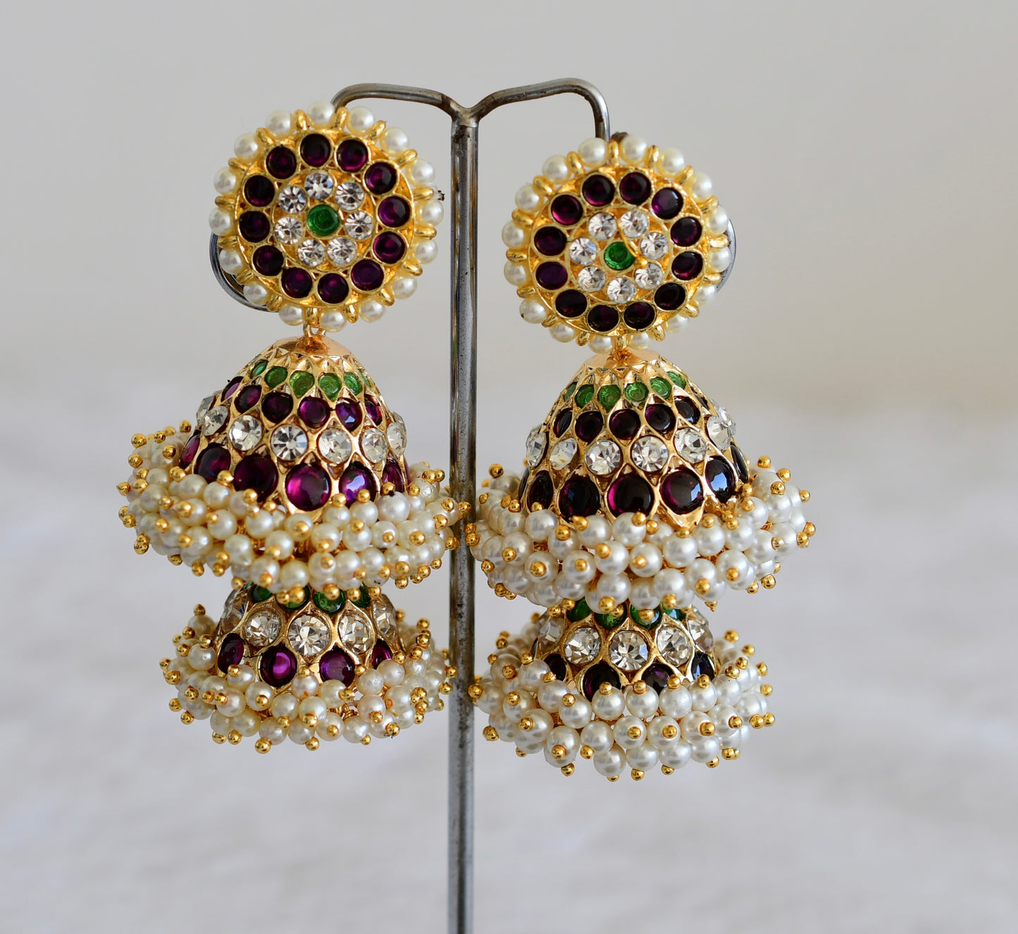 Gold tone precious kemp-green-white stone pearl big step jhumkka dj-52519