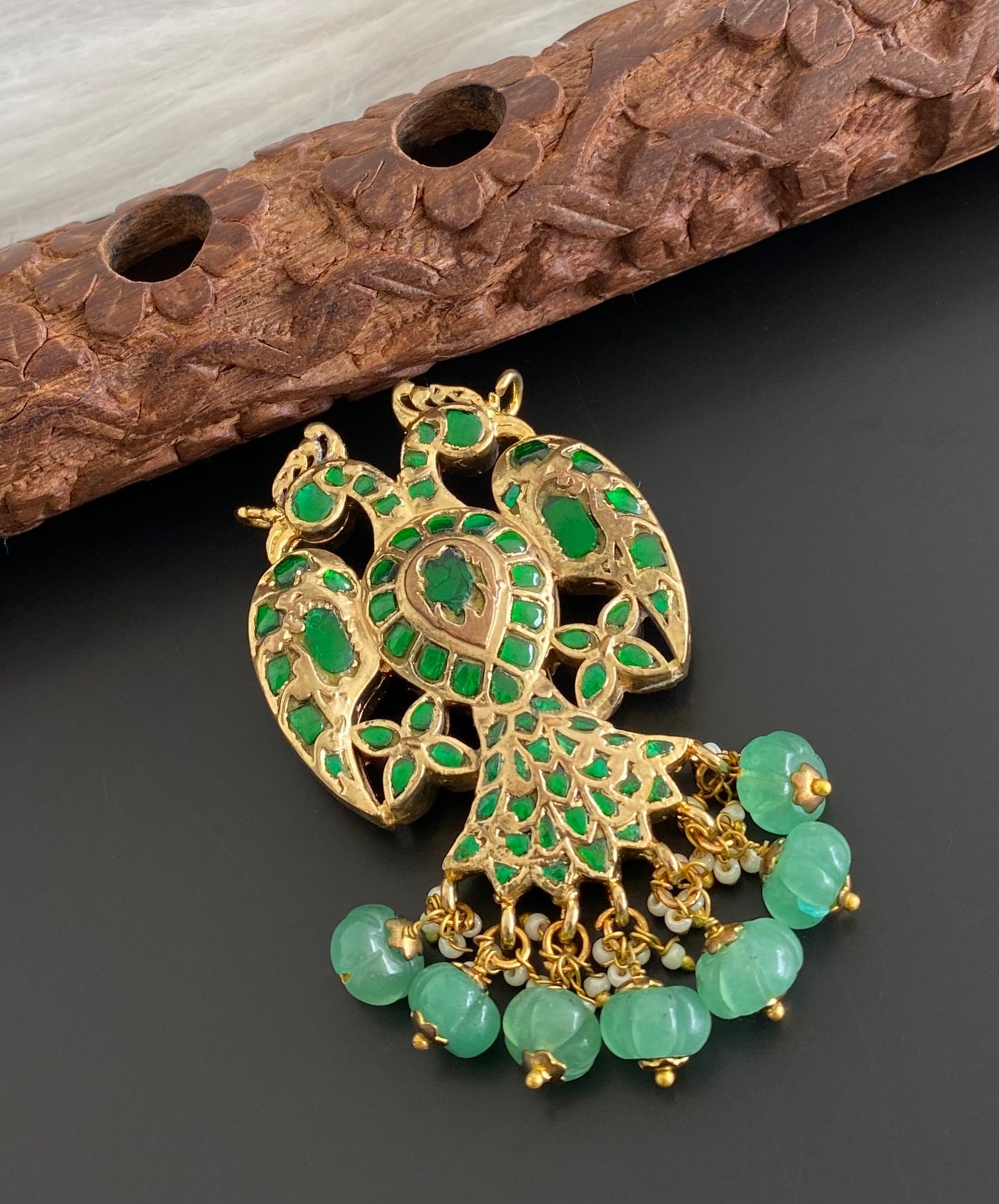 Gold tone pink-green kundan jadau reversible Gandaberunda pendant dj-53842