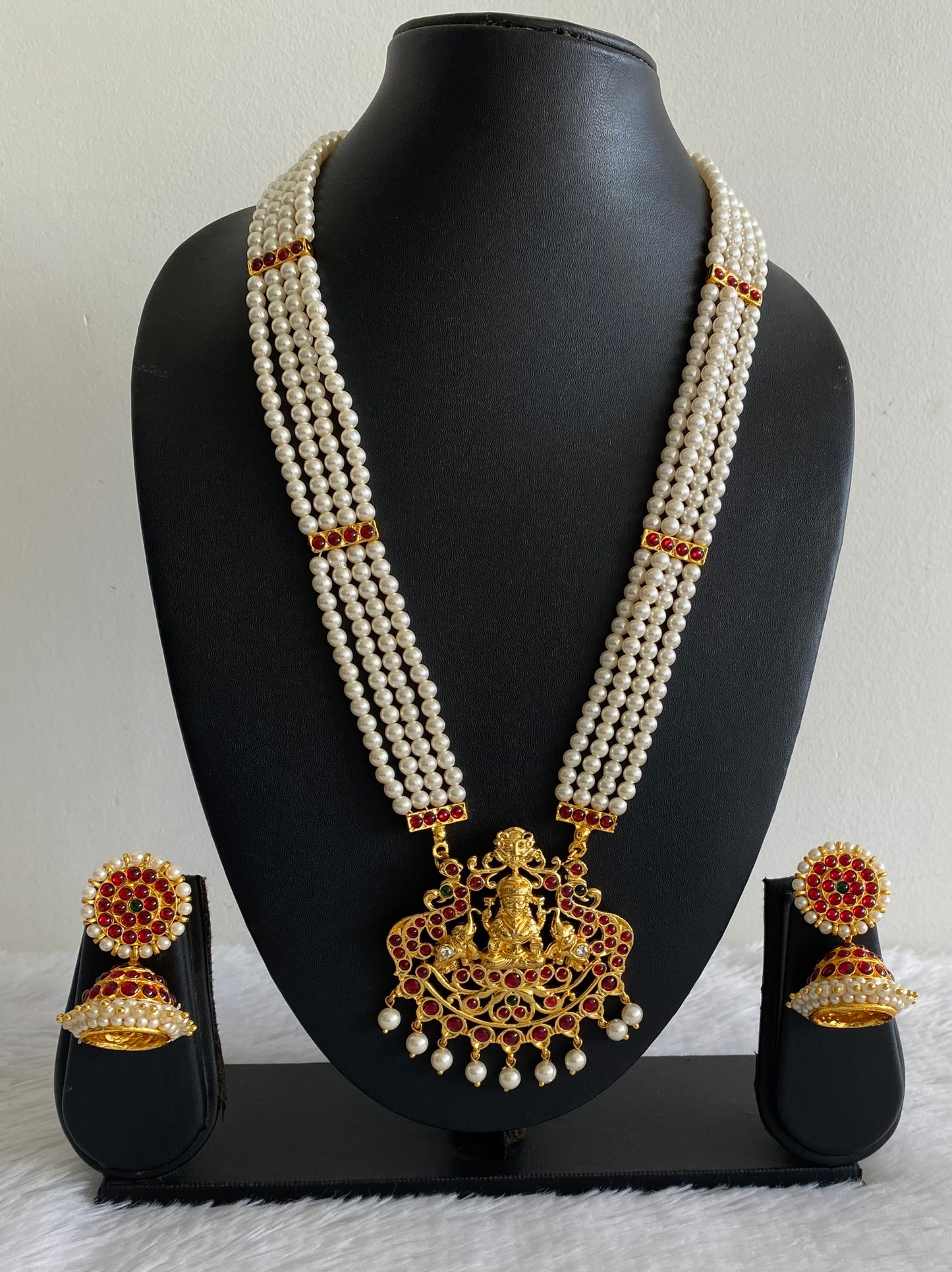 Gold tone kemp-green Gaja Lakshmi designer haar set dj-35130