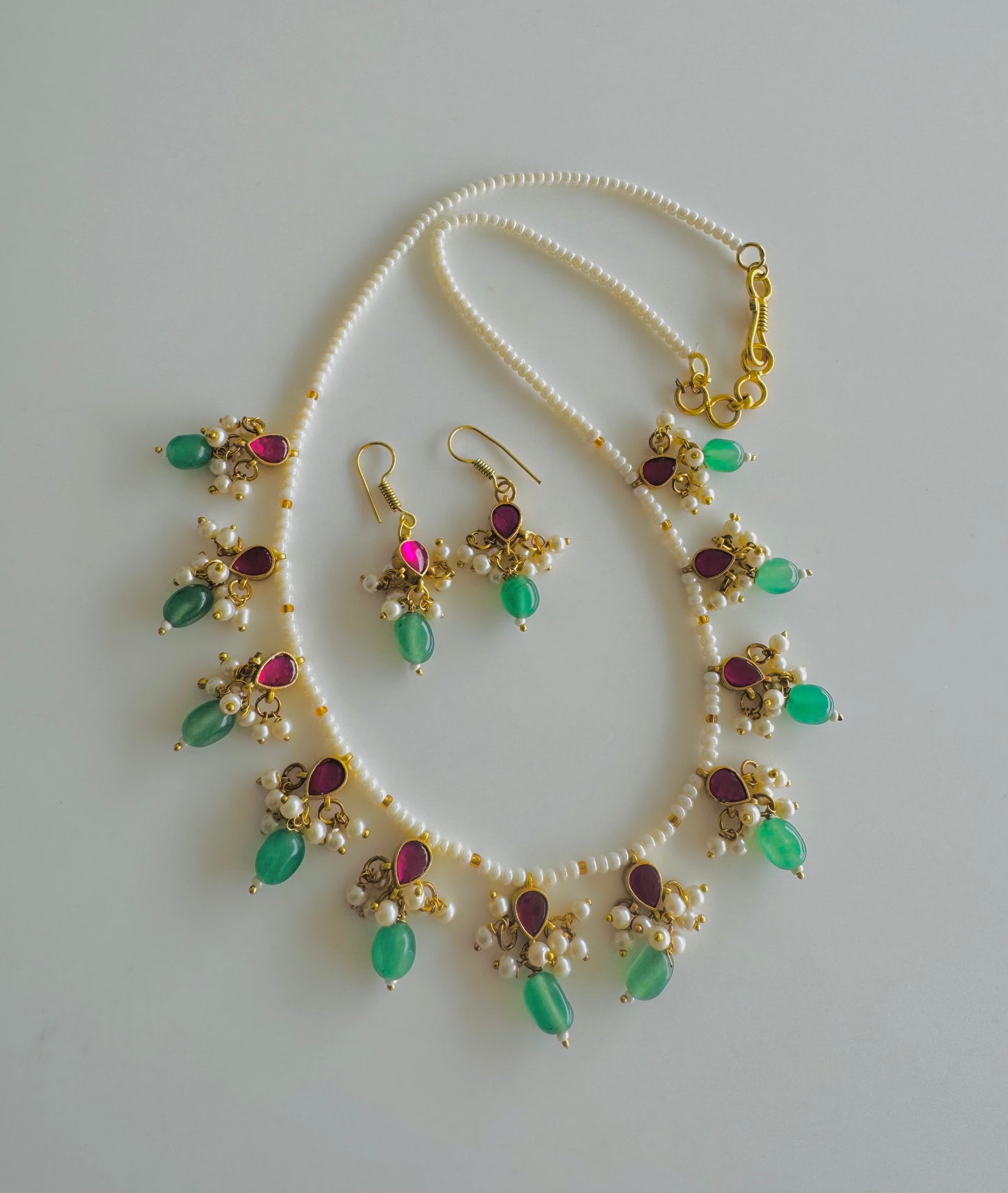 Gold tone pink-green-pearl beaded kundan jadau necklace set dj-51461