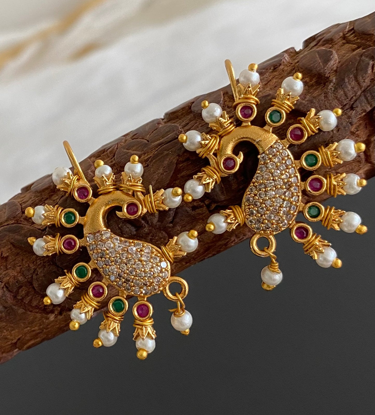 Matte gold white-pink-green stone pearl peacock bugadi earrings dj-53669