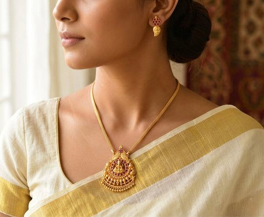 Gold tone pink stone lakshmi necklace set dj-53052