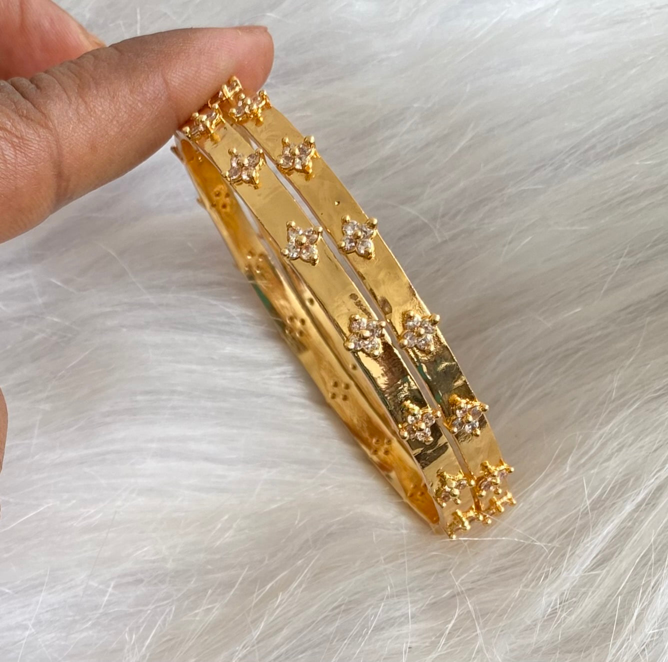 Gold tone white stone bangles (2.6) dj-54199