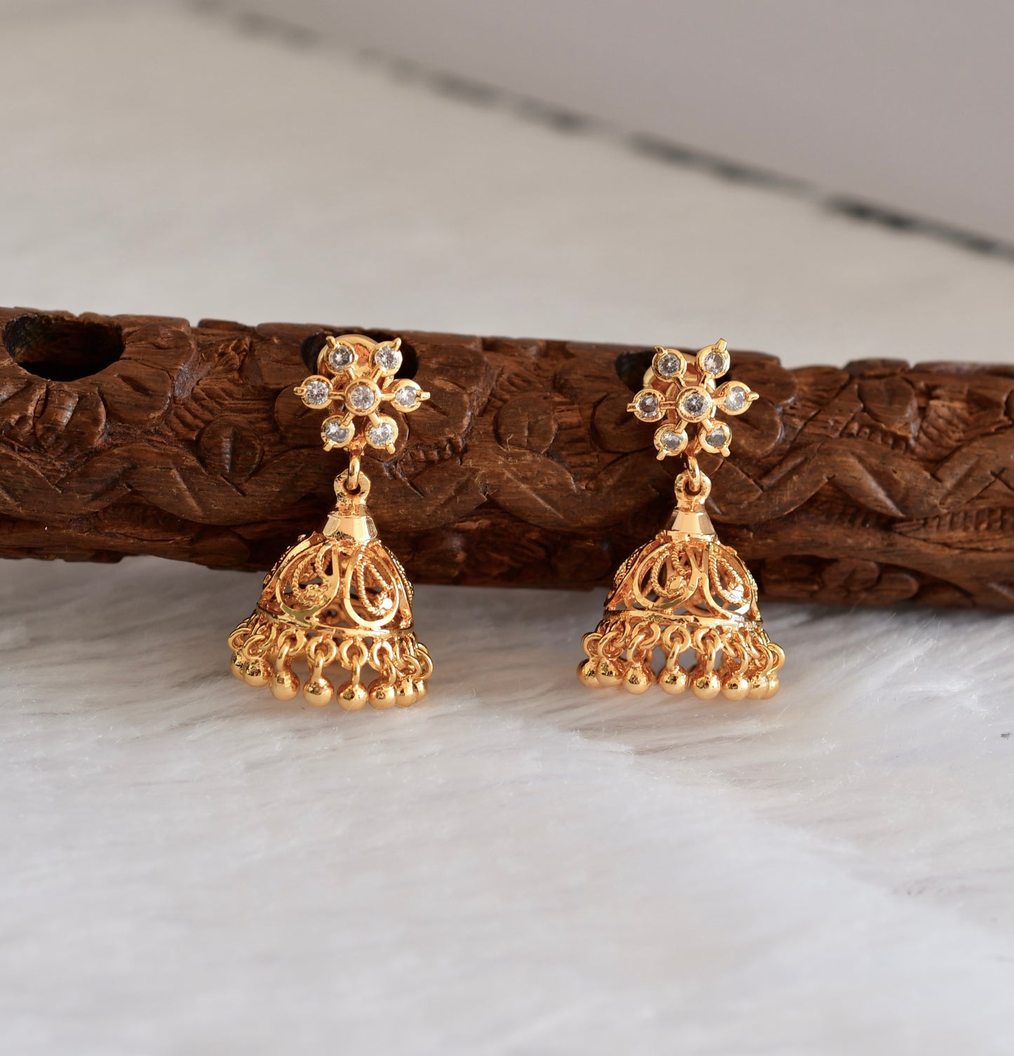 Gold tone ad white south indian flower jhumkka dj-52788