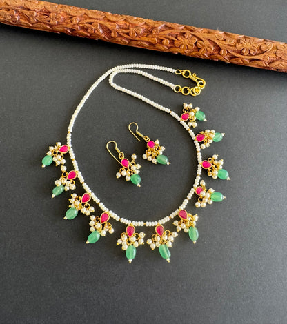 Gold tone pink-green-pearl beaded kundan jadau necklace set dj-51461