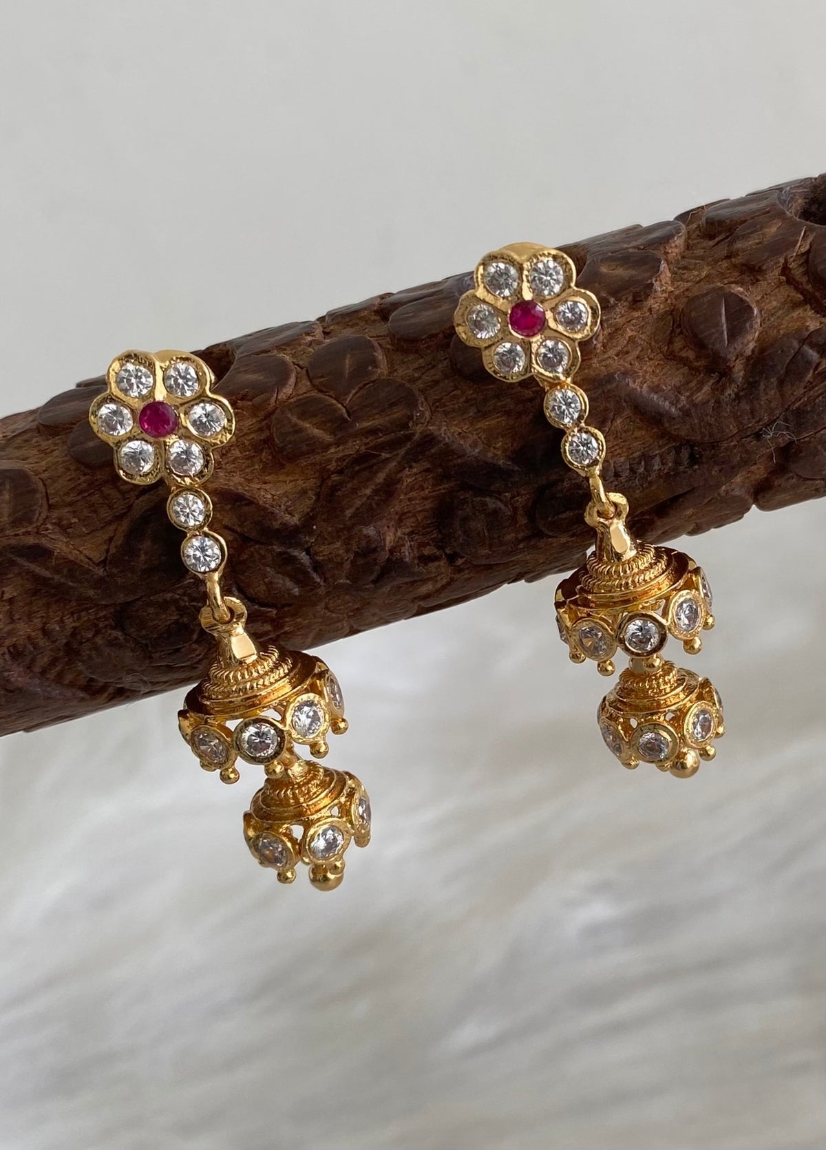 Gold tone ad pink-white stone south indian step jhumkka dj-54893