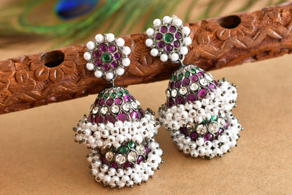 Black finish precious kemp-green-white stone pearl big step jhumkka dj-51770