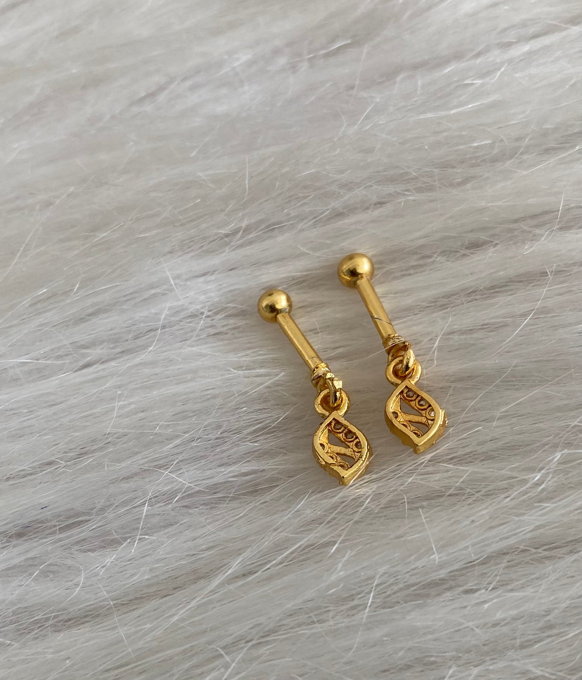 Gold tone cz white stone bugadi screw earrings dj-55128