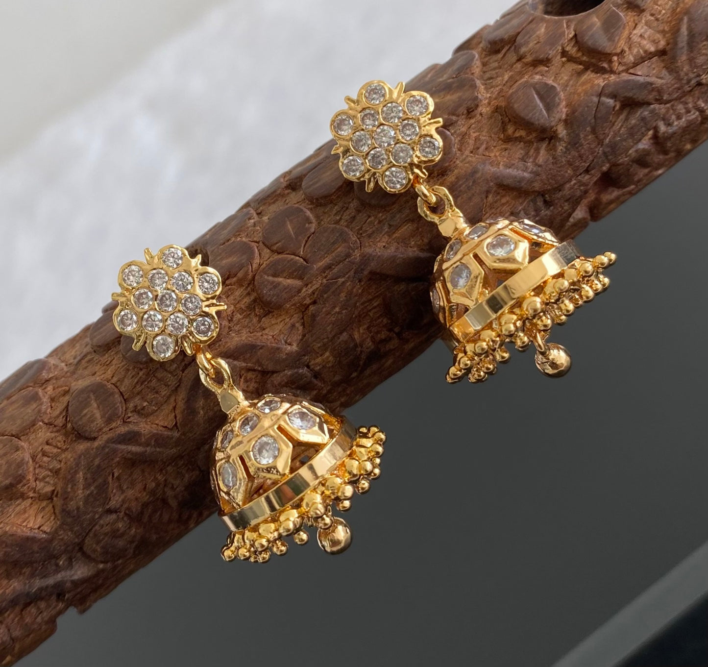 Gold look alike AD white stone jhumkka dj-53581