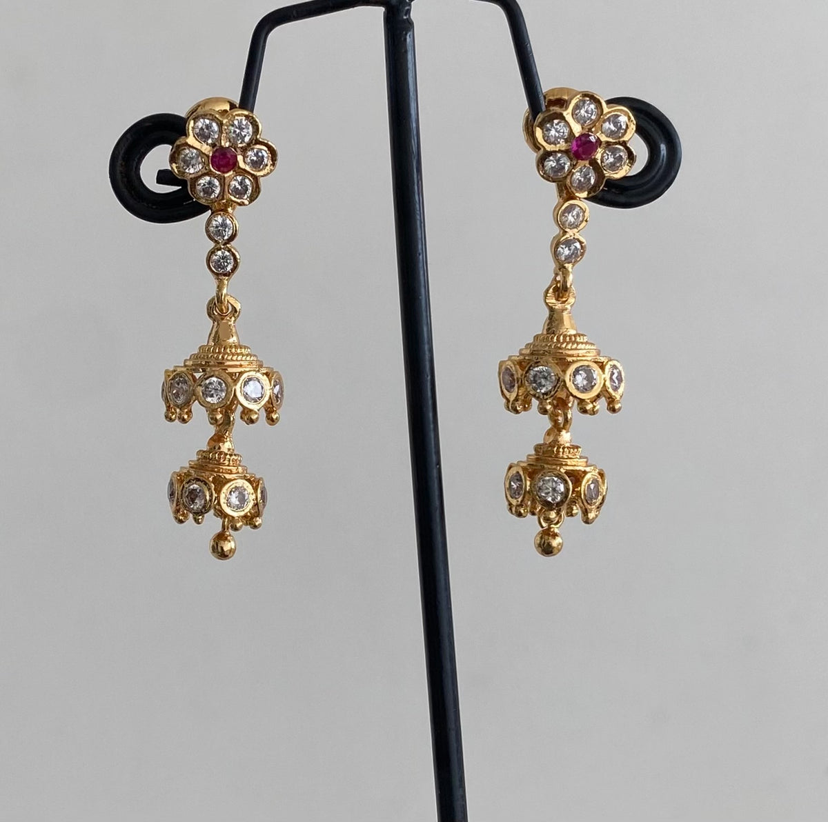 Gold tone ad pink-white stone south indian step jhumkka dj-54893