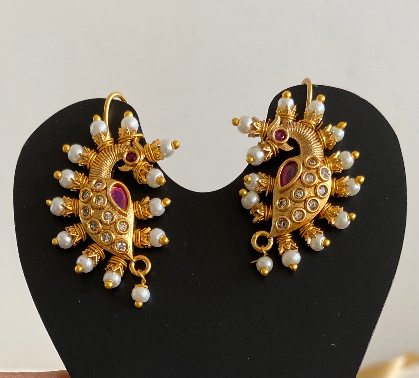 Matte gold pink-white stone pearl peacock bugadi earrings dj-53672