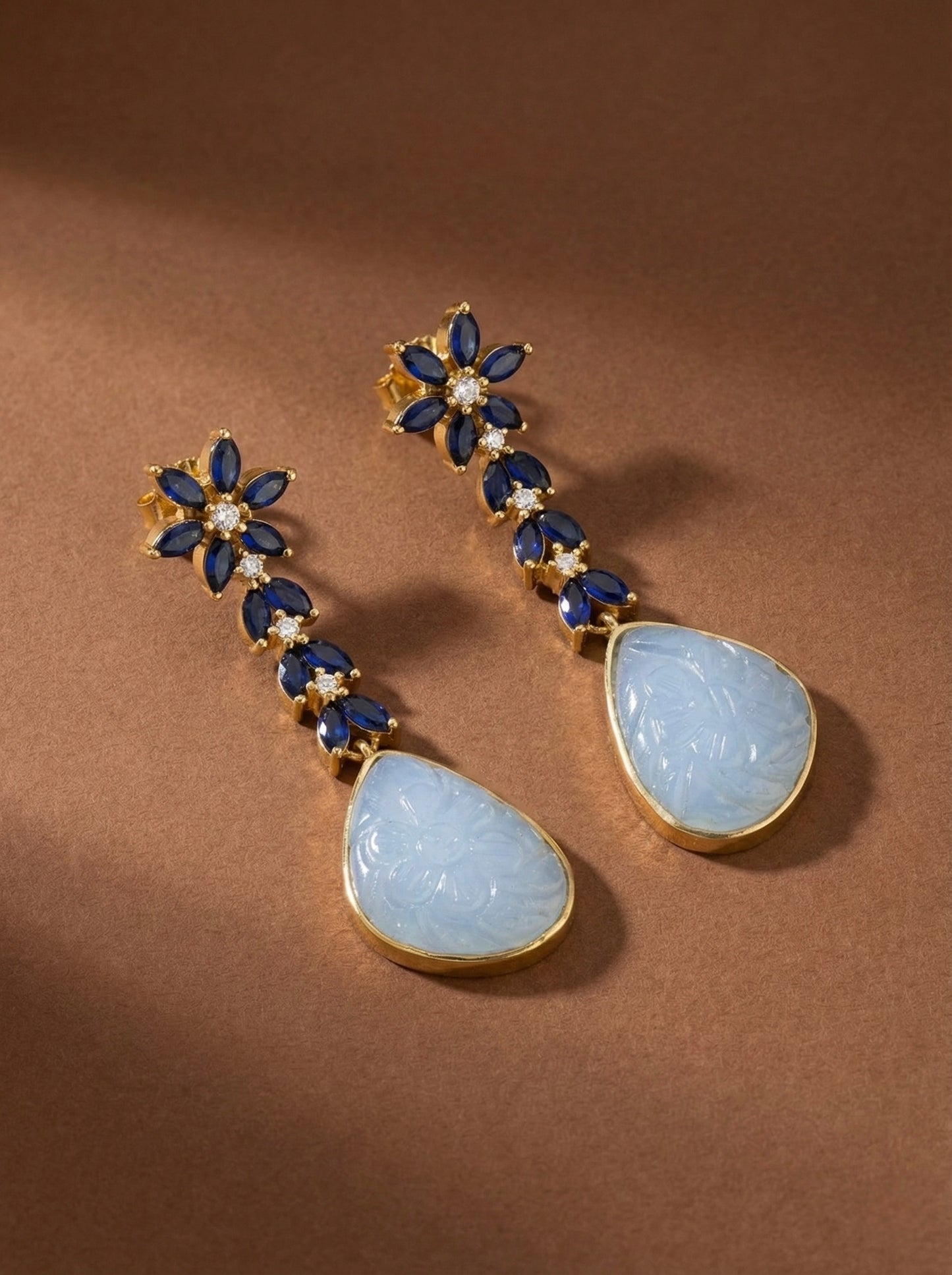 Gold tone blue carved stone earrings-dj52590