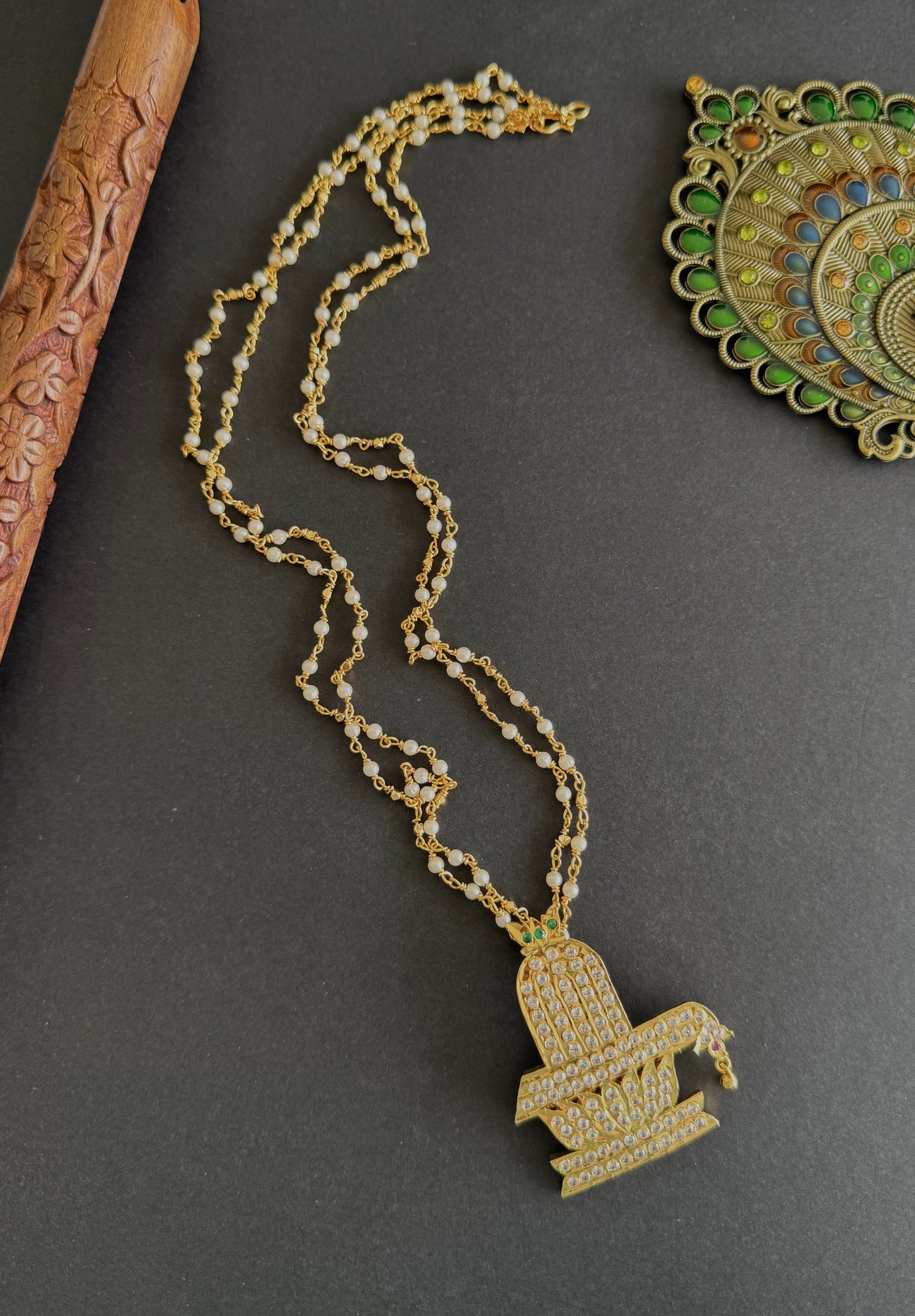 Gold tone 24 inches chain with AD shiva lingam pendant dj-52224