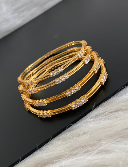 Gold tone white stone set of 4 bangles(2.10) dj-55167