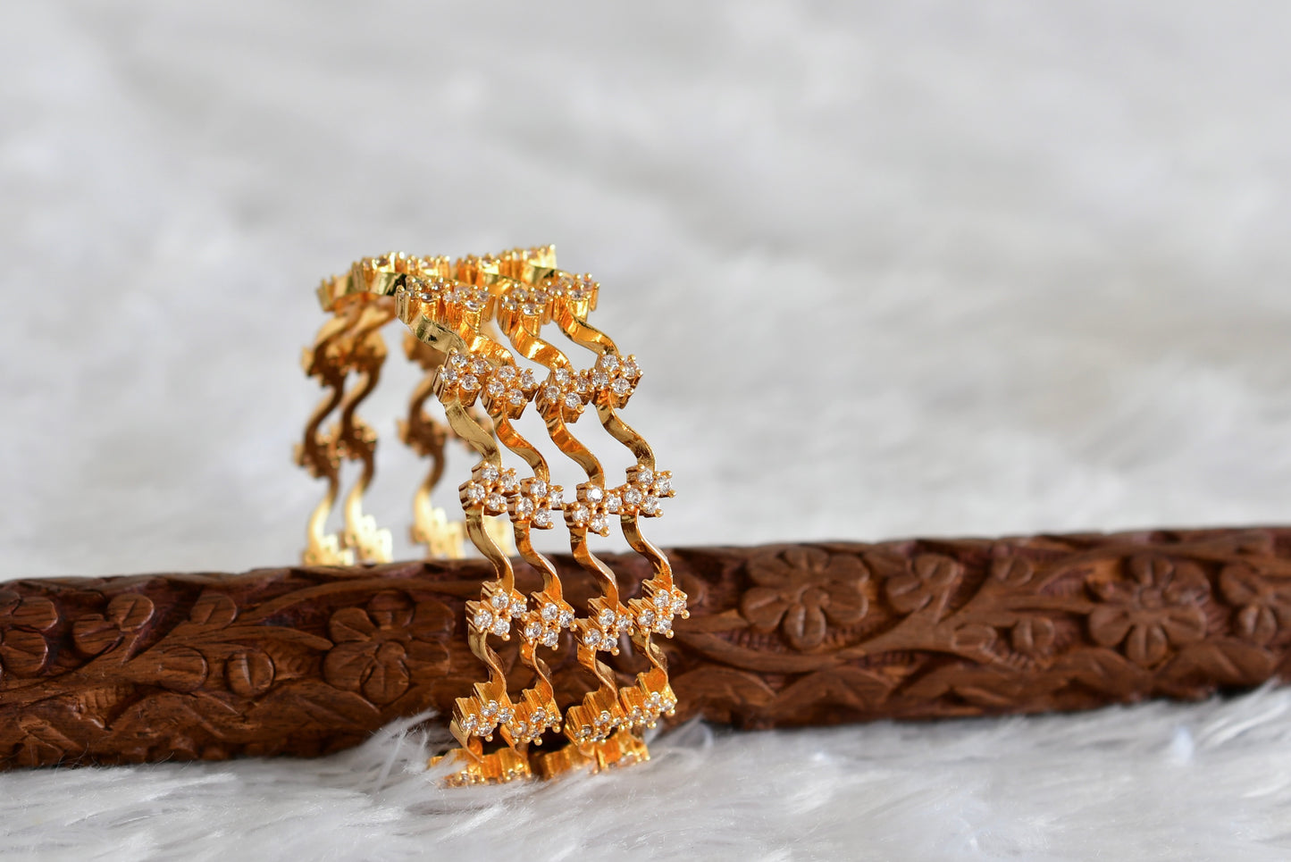 Gold tone cz white set of 4 bangles(2.6) dj-51792