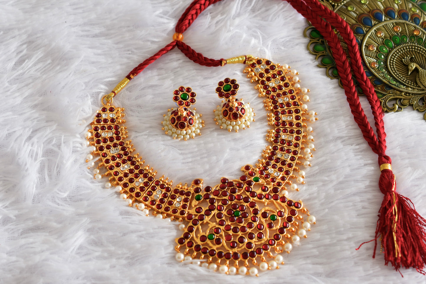 Gold tone kemp-green poothali necklace set dj-52356