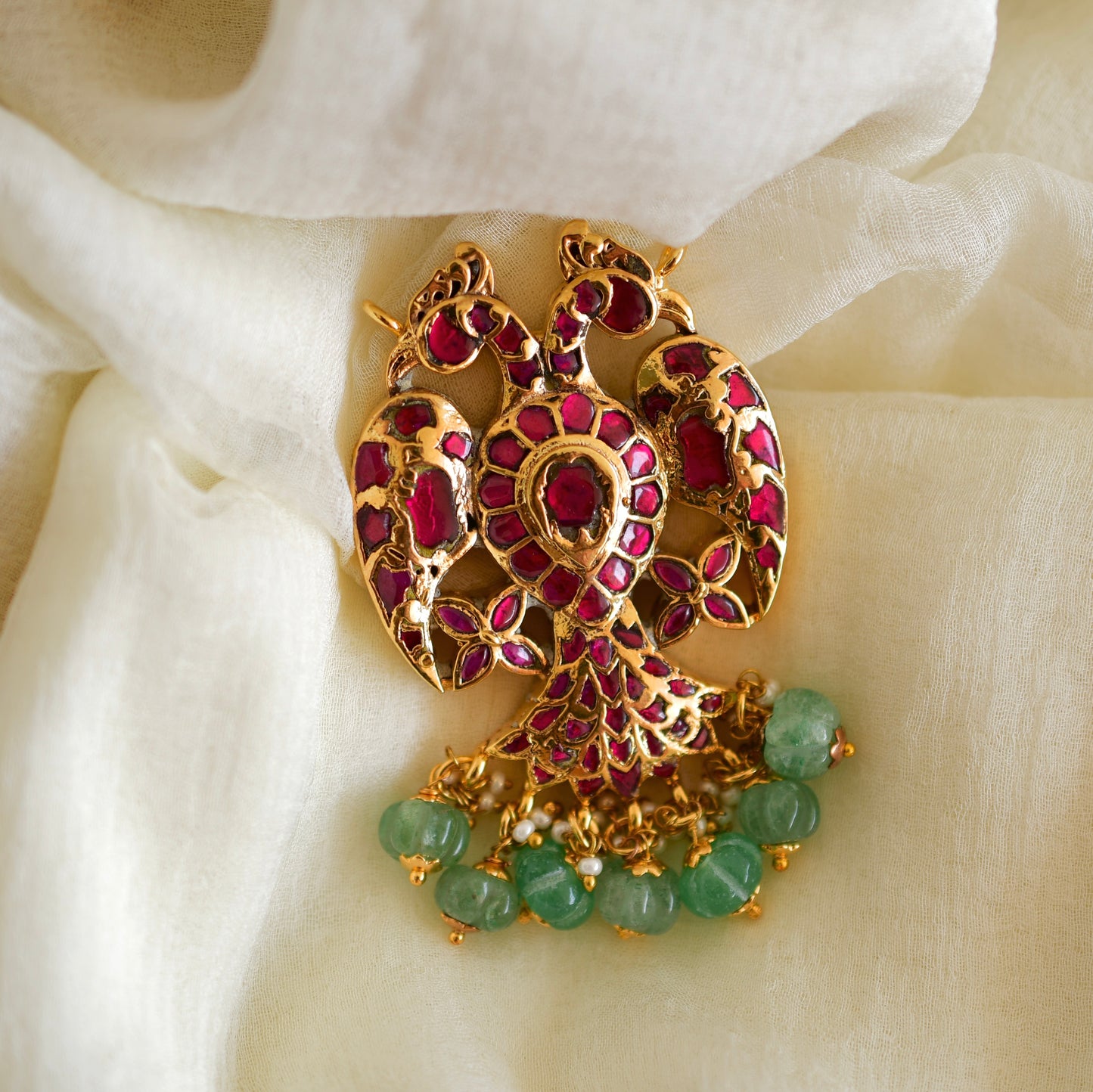 Gold tone pink-green-white kundan jadau reversible Gandaberunda pendant dj-52638