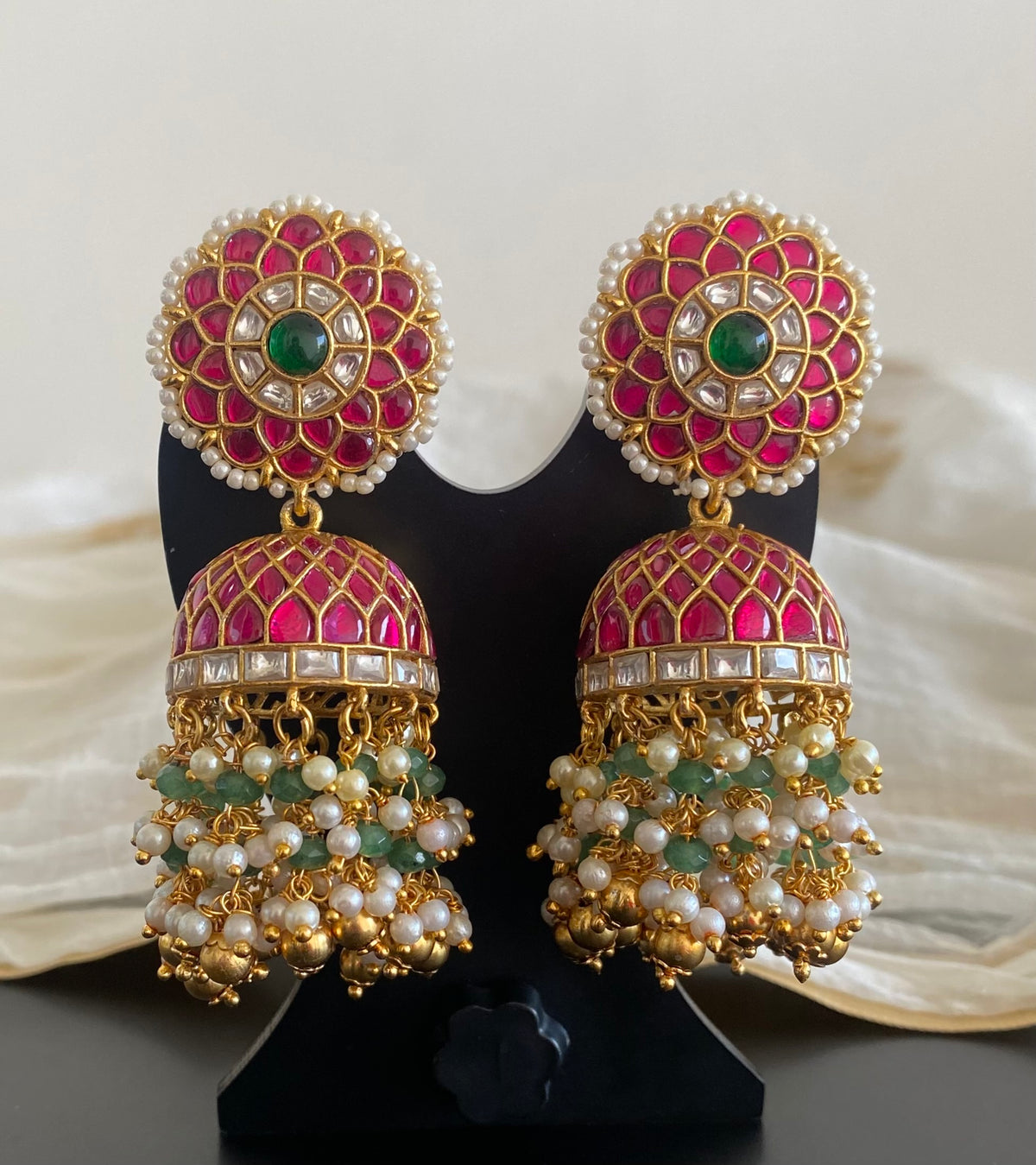 Gold tone pink-white kundan jadau green beaded pearl big jhumkka dj-55100