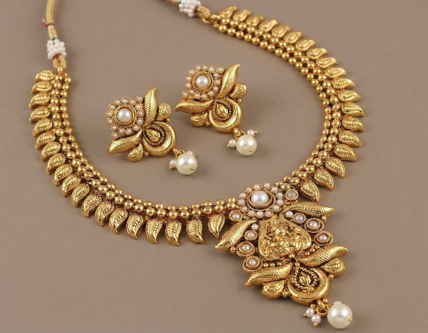 Antique gold tone pearl lakshmi necklace set-dj07498