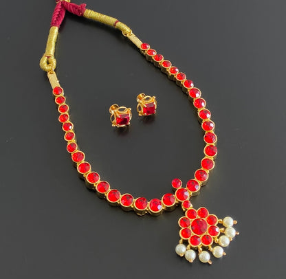 Gold tone AD red stone pearl attigai necklace set dj-55029