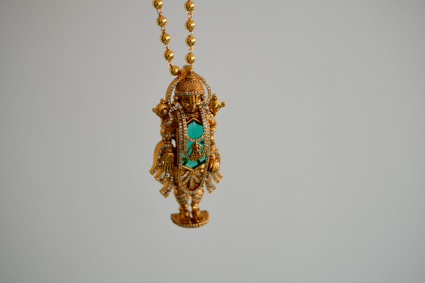 Gold tone 24 inches chain with green Shri Thirumal pendant dj-52616