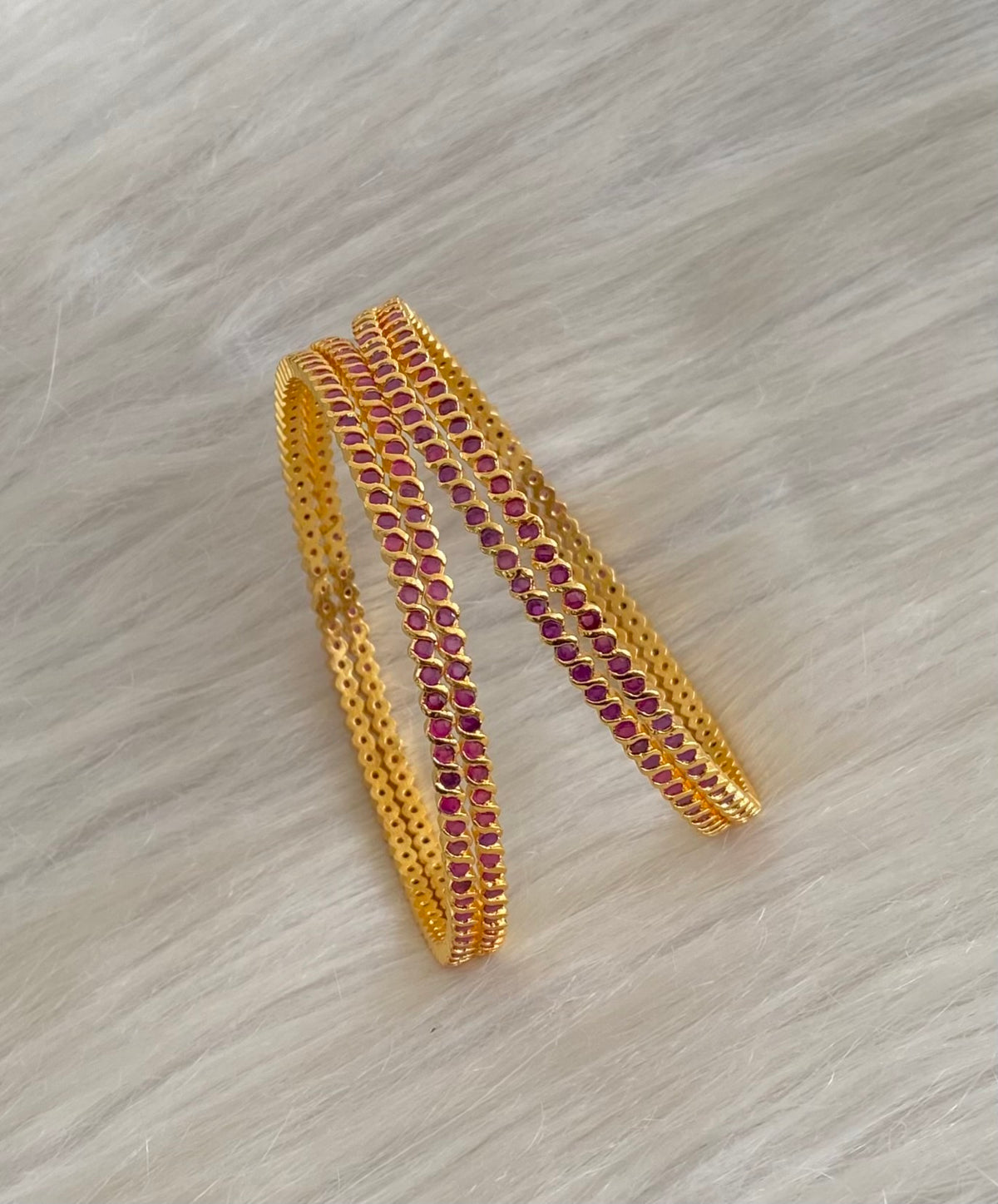 Gold tone pink stone set of 4 bangles(2.10) dj-55152