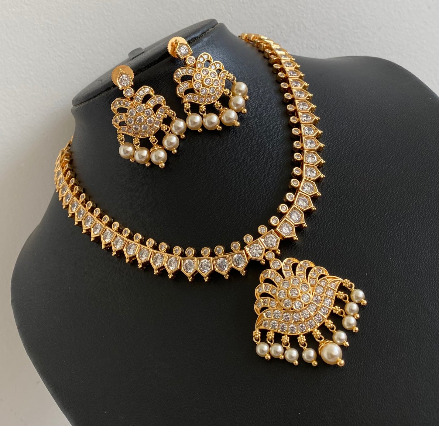 Gold tone AD white stone pearl south indian style necklace set dj-53421