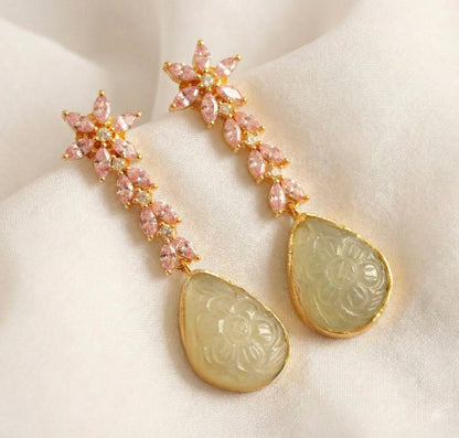 Gold tone baby pink-cream carved stone earrings-dj52593