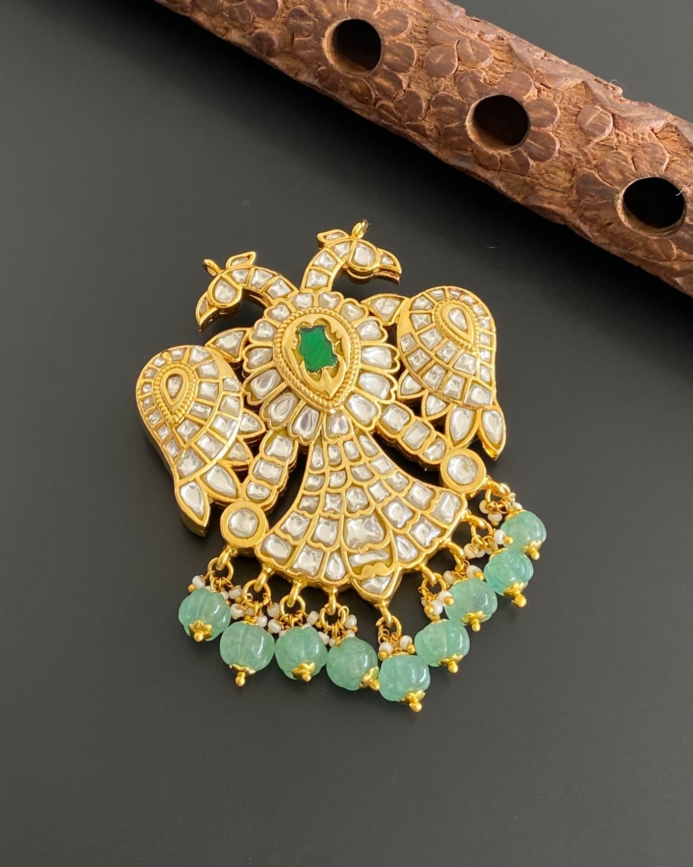 Gold tone pink-green-white kundan jadau Gandaberunda reversible pendant dj-53551