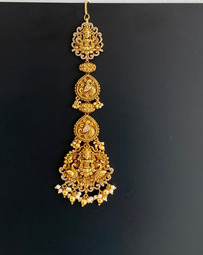Antique gold tone cz white lakshmi peacock tikka dj-52058
