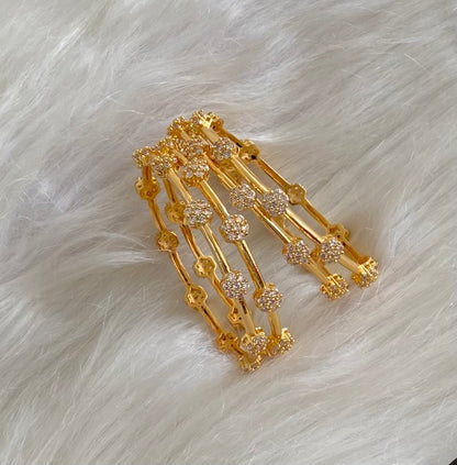 Gold tone white stone set of 4 bangles (2.6) dj-54824