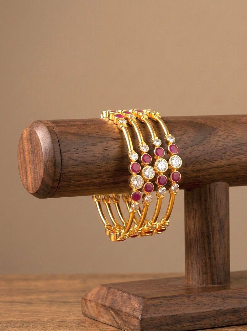 Gold Tone Cz Ruby Set Of 4 Bangles(2.6) DJ27662