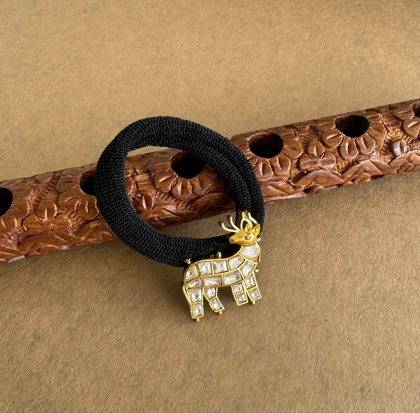 Matte finish white kundan jadau deer hair band dj-51513