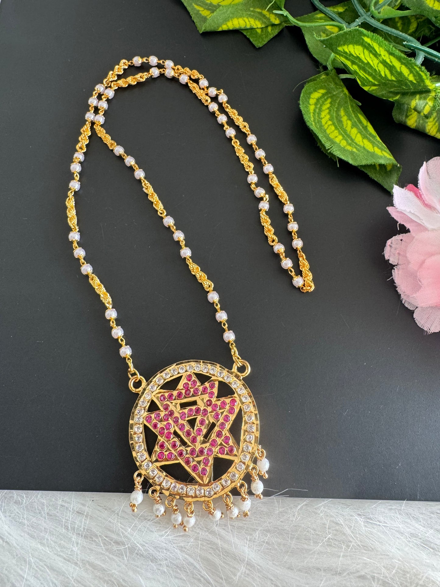 Gold tone 24 inches pearl chain with AD pink Chakram pendant dj-51193