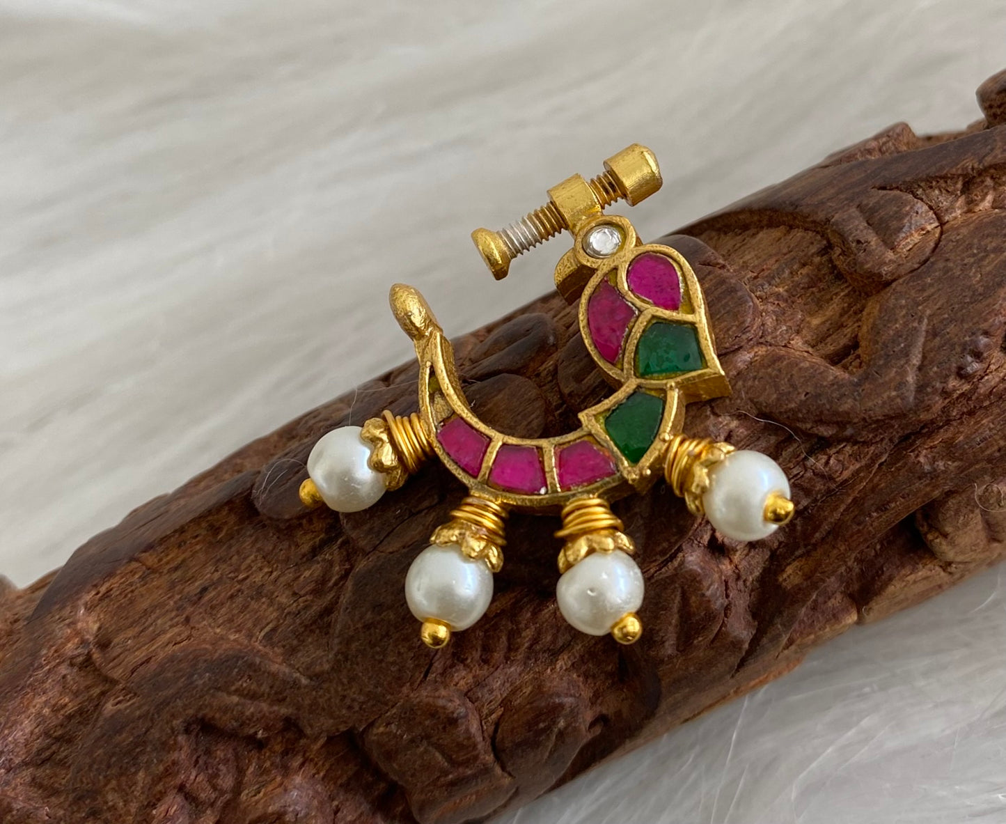 Gold tone kundan jadau pink-green stone pearl bird nose pin dj-53720