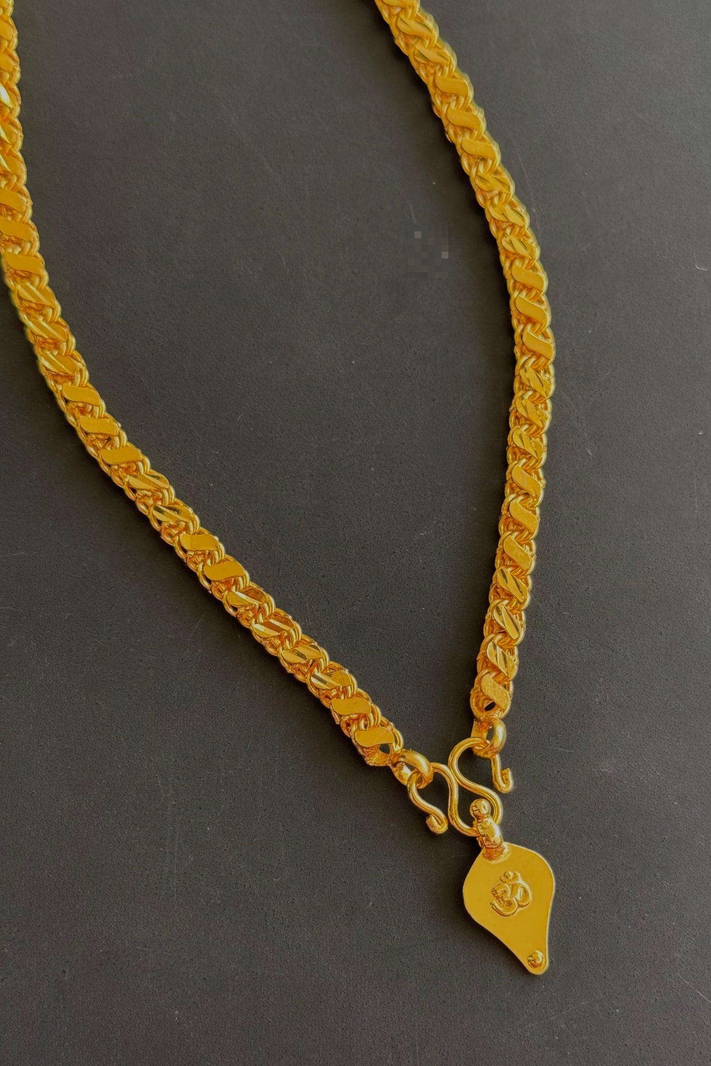 Gold tone 24 inches chain with om elakka thali pendant dj-49926