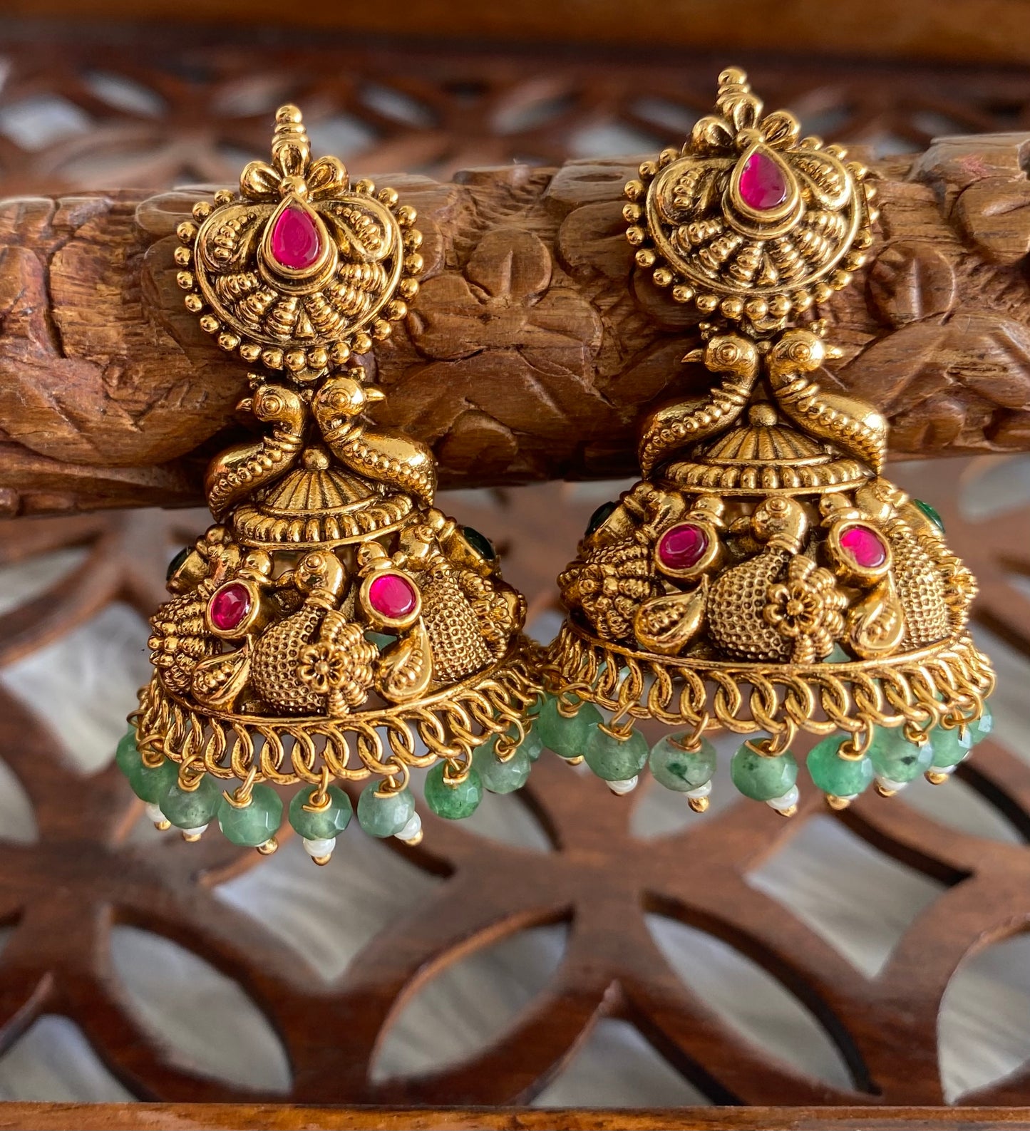 Antique gold tone pink-green beaded swan jhumkka dj-51051