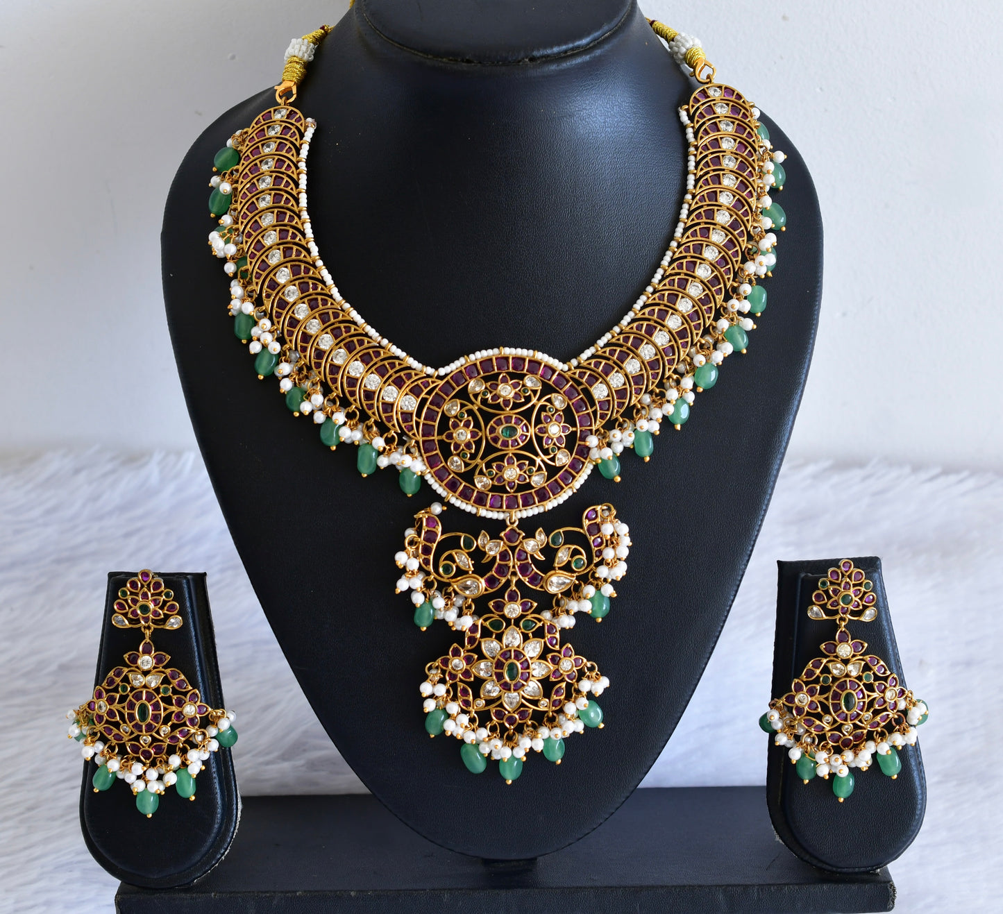 Antique gold tone ruby kundan peacock flower necklace set dj-53023