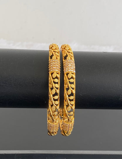 Gold tone white stone set of 2 Bangles (2.4) dj-38348