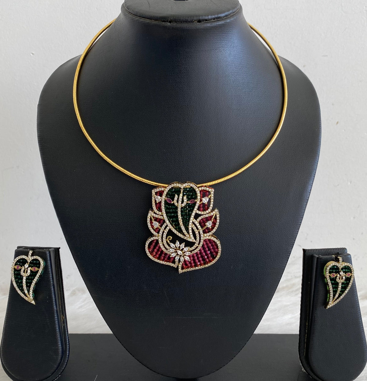 Antique gold tone cz white stone ruby-green beaded ganesha pendant set with kanti necklace dj-55121