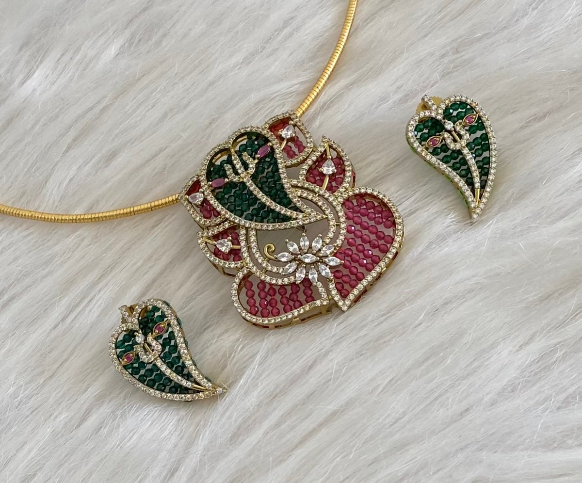 Antique gold tone cz white stone ruby-green beaded ganesha pendant set with kanti necklace dj-55121
