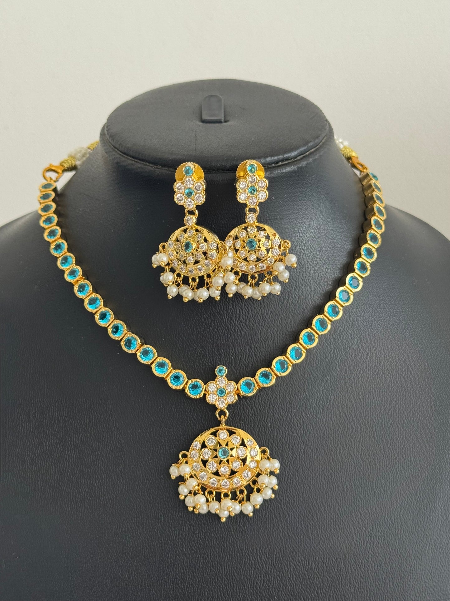 Gold tone AD Cerulean blue south indian style attigai/necklace set dj-51670