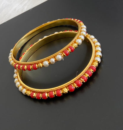 Gold tone coral-pearl beaded bangles(2.8) dj-53705