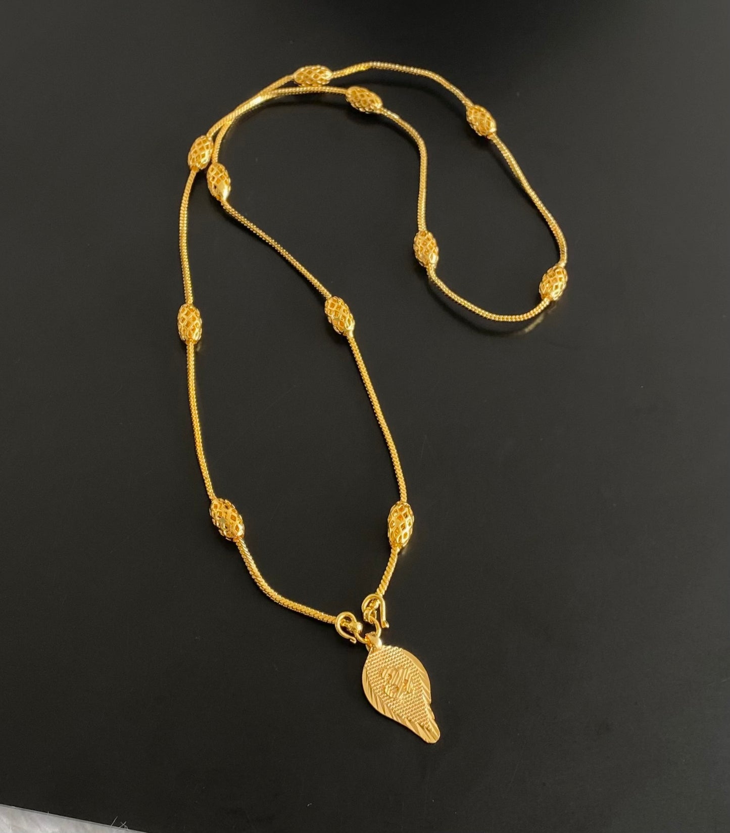 Gold tone 24 inches chain with om pendant dj-54386