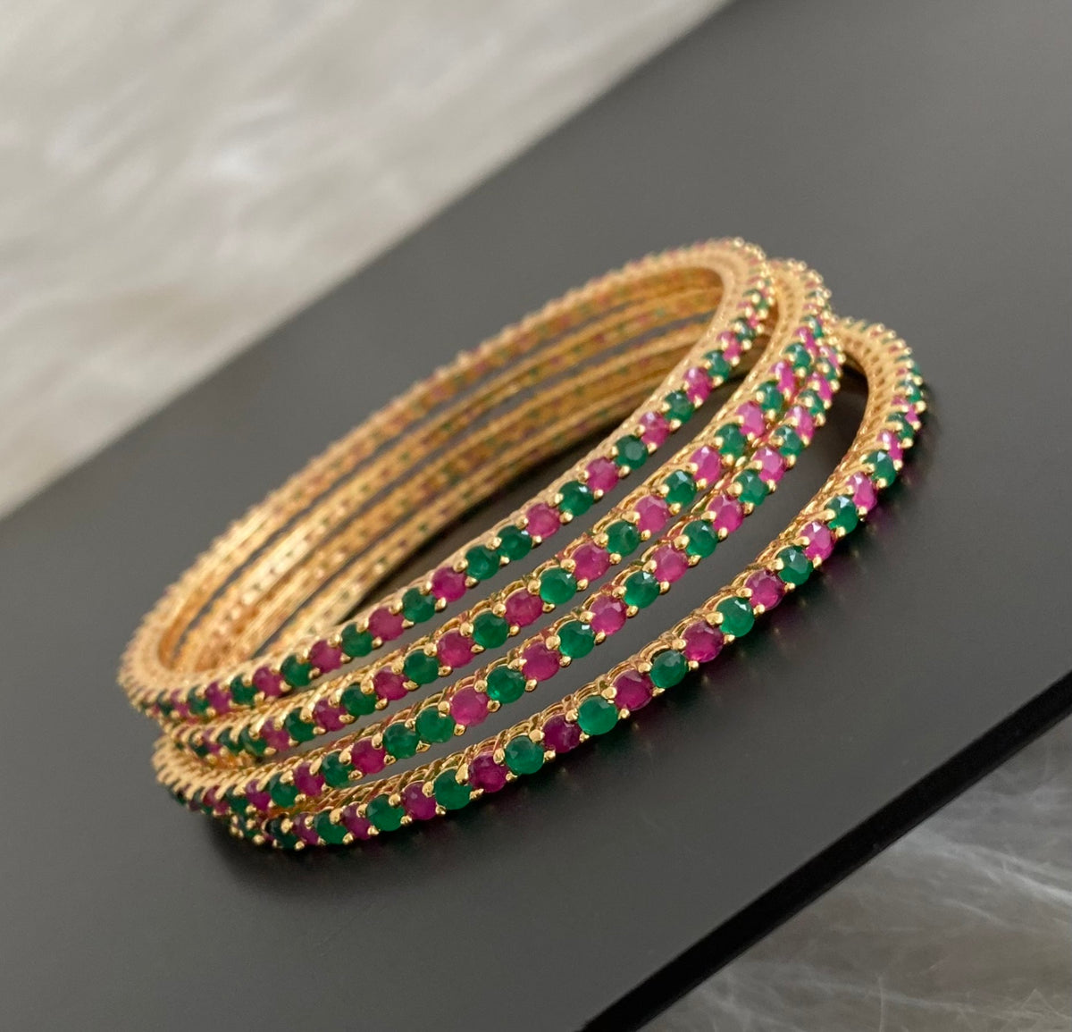 Gold tone ruby green stone set of 4 bangles(2.10) dj-55149