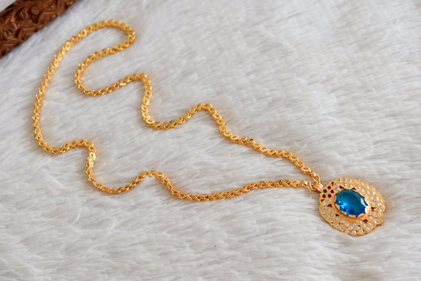 Gold tone 24 chain with sky blue oval stone pendant dj-51914