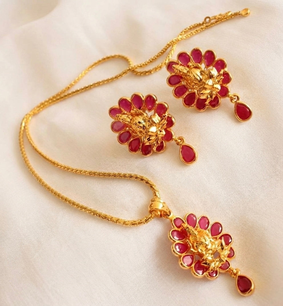 Gold Tone Ruby Lakshmi Pendant set with 18 inches chain DJ18223