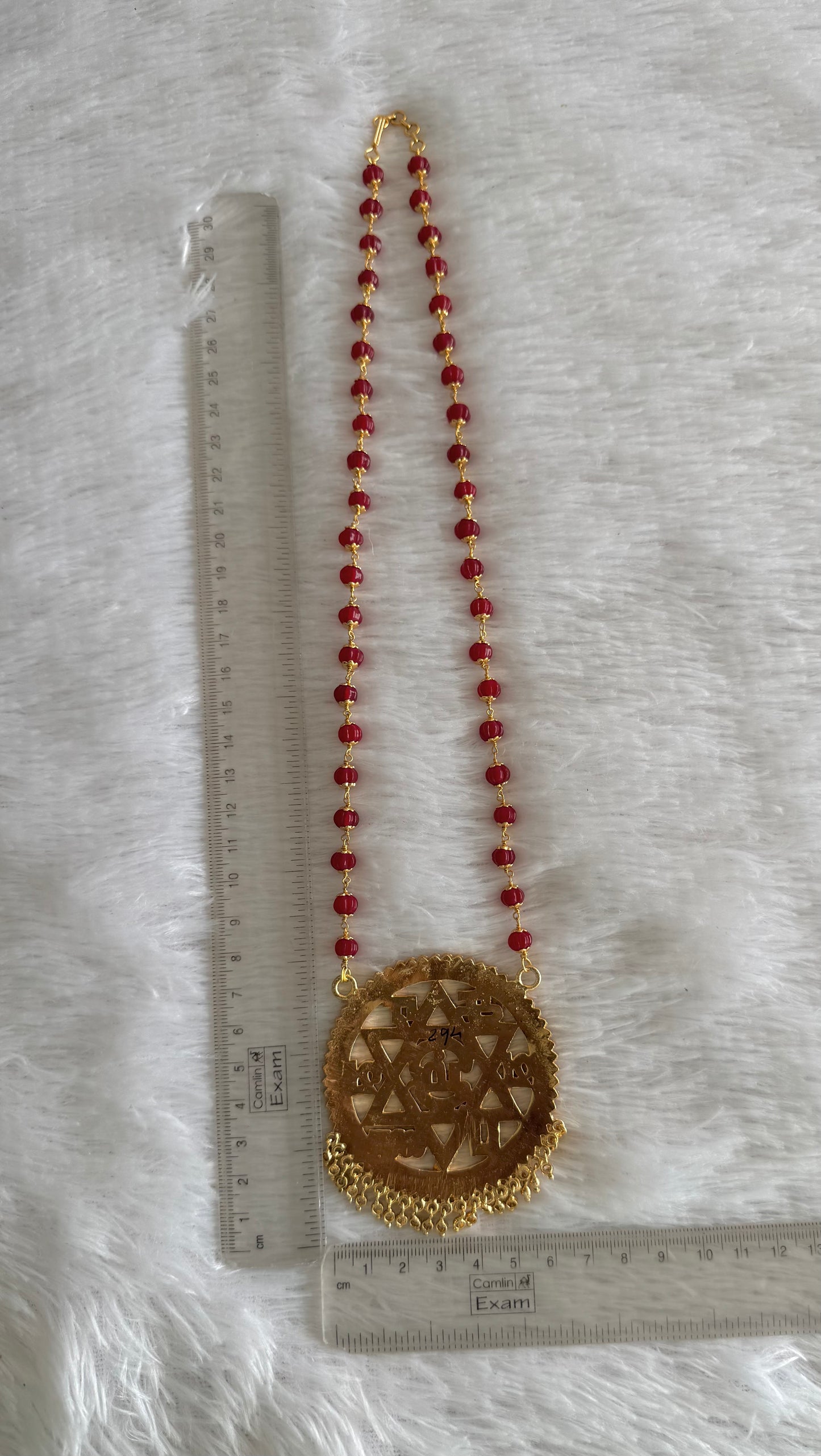 Gold tone maroon beaded chain with Tamil “Om Saravana Bhava” pendant dj-52227