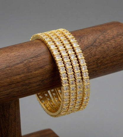 Gold tone cz white square stone set of 4 bangles(2.10) dj-45626
